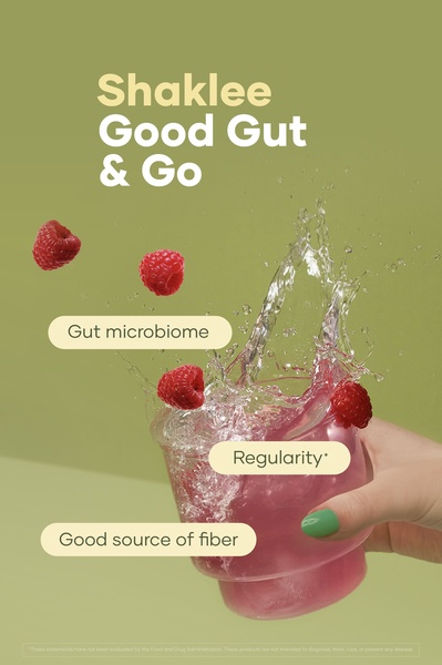 A fiber supplement ad showcasing product benefits through dynamic splash imagery and clear, concise text callouts.